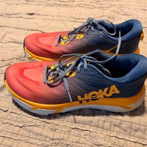 Hoka Pink and Blue Athletic Shoes with Yellow Accents